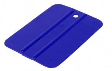 Blue plastic tool on a white background